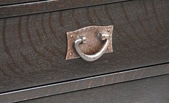 Detail hand hammered copper pull, an accurate replica of an original Gustav Stickley pull.